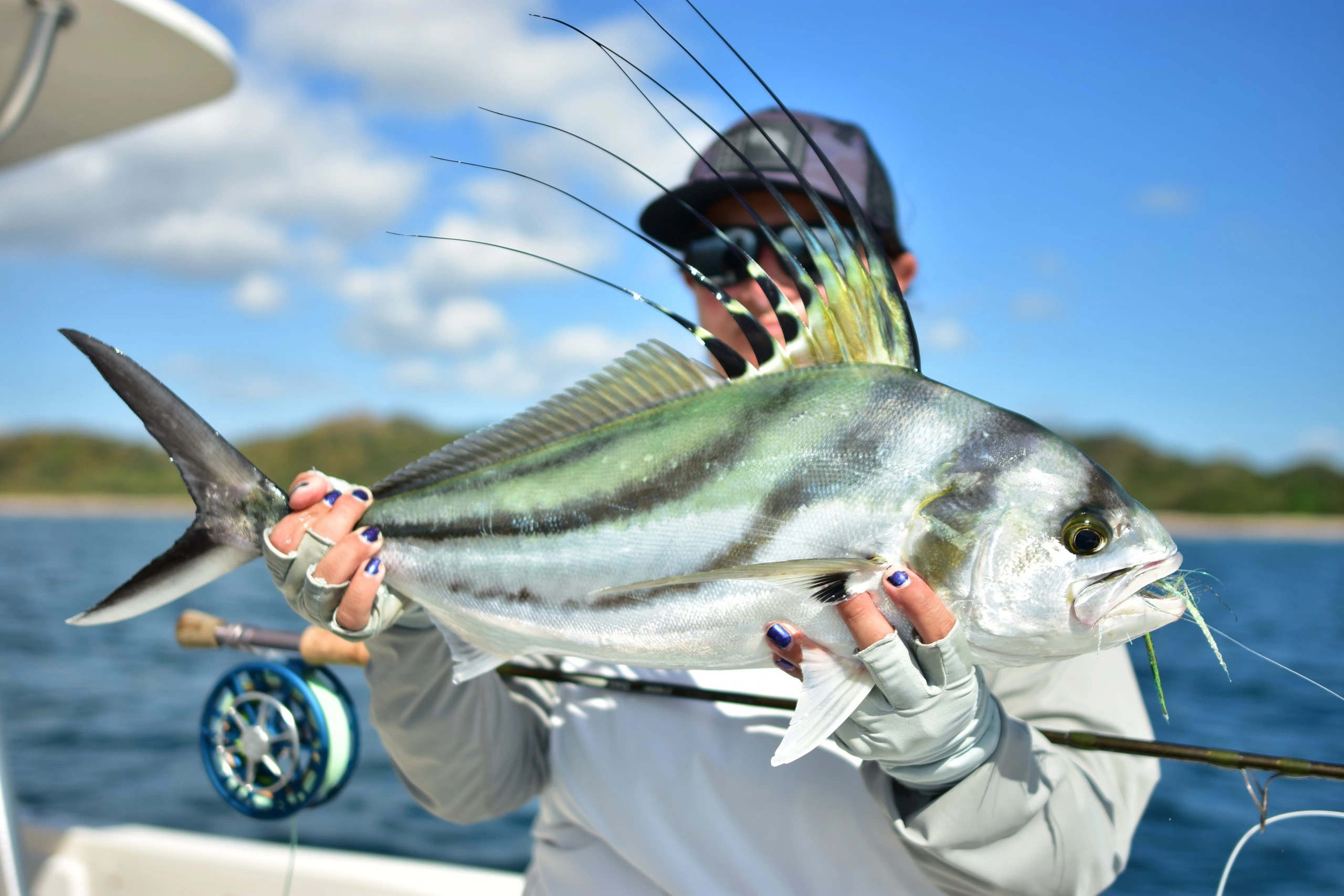 How to Maximize Your Catch Rate: The Ultimate Guide to Fly Fishing in Costa Rica Jenn Dorosh with a Rooster Fish